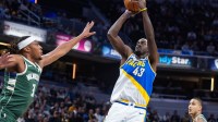 Indiana Pacers forward Pascal Siakam (43) shoots the ball while Milwaukee Bucks center/forward Myles Turner (3) defends in the first half at Gainbridge Fieldhouse.