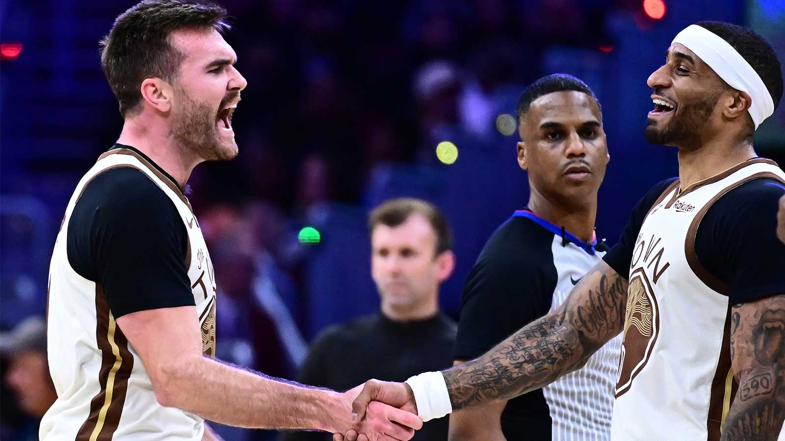Golden State Warriors guard Pat Spencer (61) celebrates with guard Gary Payton II (0) against the Cleveland Cavaliers during the second half at Rocket Arena. 
