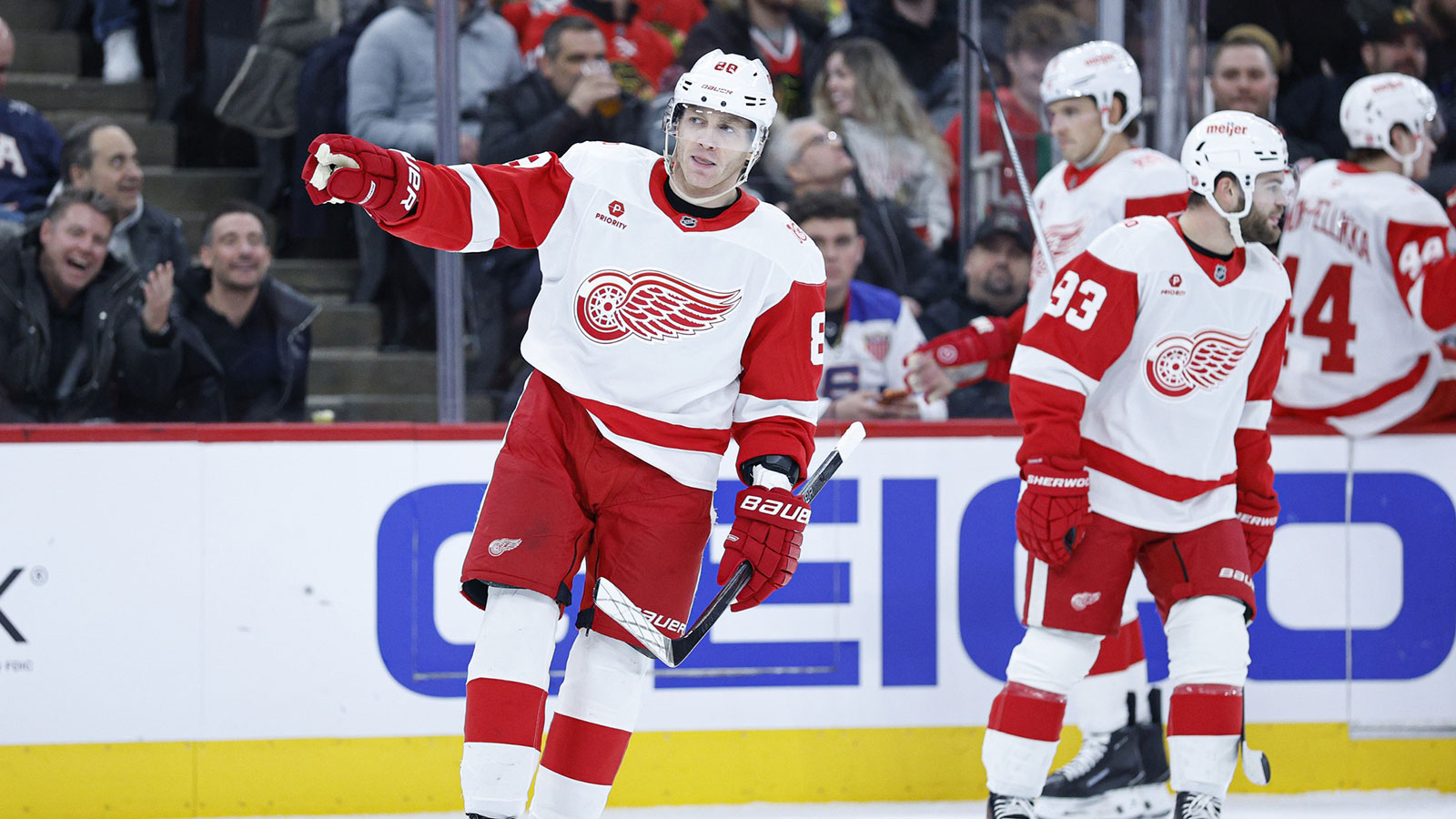 Detroit Red Wings right wing Patrick Kane (88) celebrates after scoring against the Chicago Blackhawks during the first period at United Center.