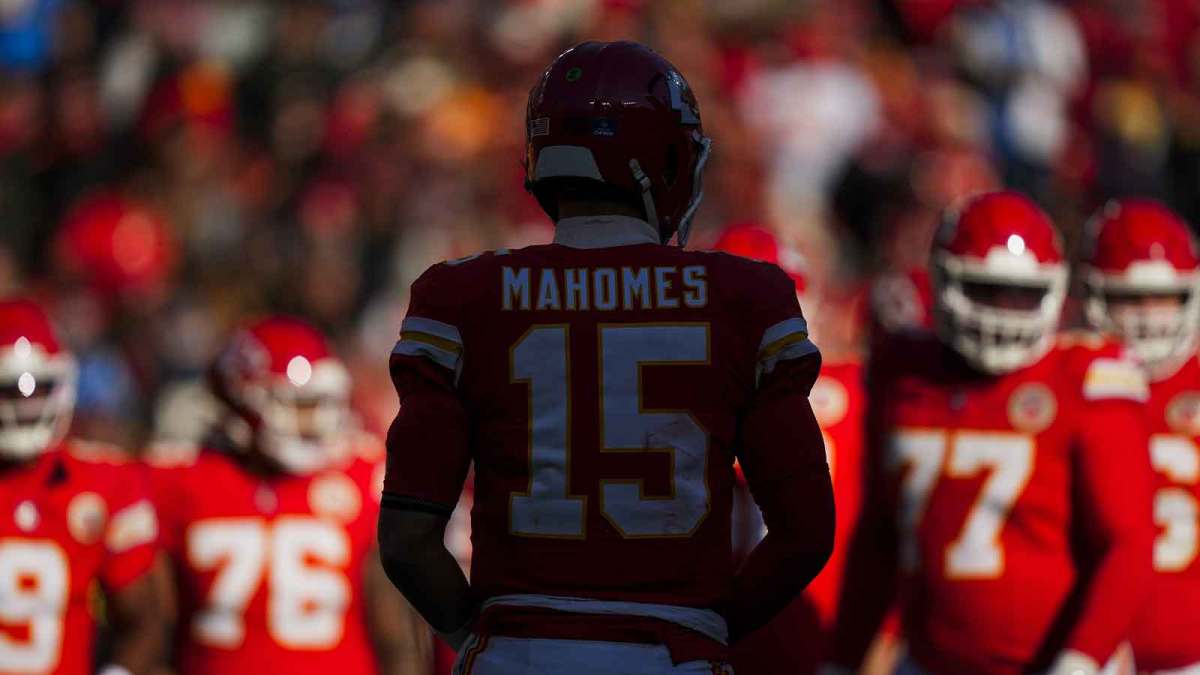 Kansas City Chiefs quarterback Patrick Mahomes (15) walks to the huddle from the sideline during the second quarter against the Los Angeles Chargers at GEHA Field at Arrowhead Stadium. Mandatory Credit: Jay Biggerstaff-Imagn Images