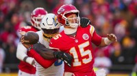 Los Angeles Chargers linebacker Odafe Oweh (98) sacks Kansas City Chiefs quarterback Patrick Mahomes (15) during the second half at GEHA Field at Arrowhead Stadium.