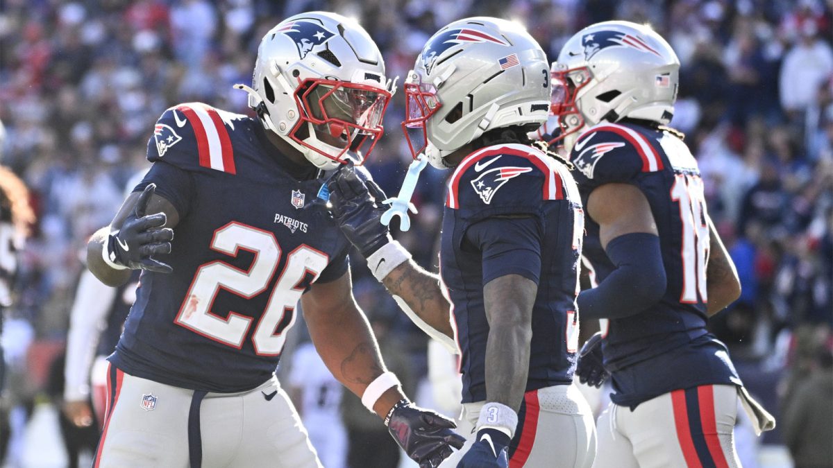 New England Patriots running back Terrell Jennings (26) celebrates his touchdown against the Atlanta Falcons during the first half at Gillette Stadium.
