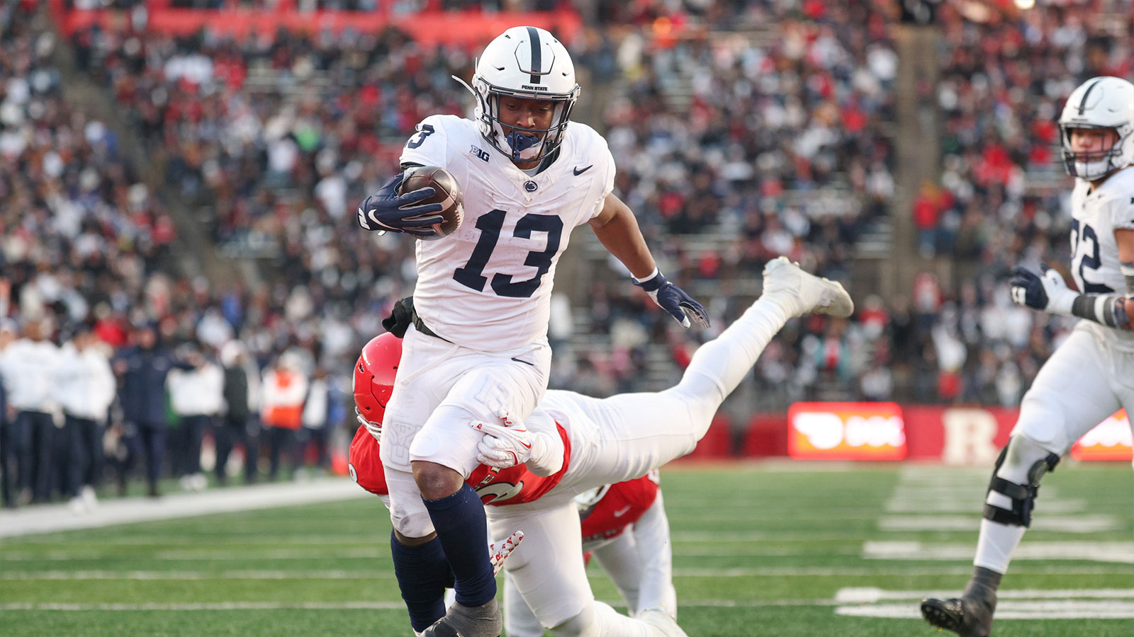 Penn State Nittany Lions running back Kaytron Allen (13) scores a rushing touchdown during the first half against the Rutgers Scarlet Knights at SHI Stadium.