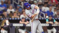 New York Mets first baseman Pete Alonso (20) hits a solo home run against the Miami Marlins in the third inning at loanDepot Park.