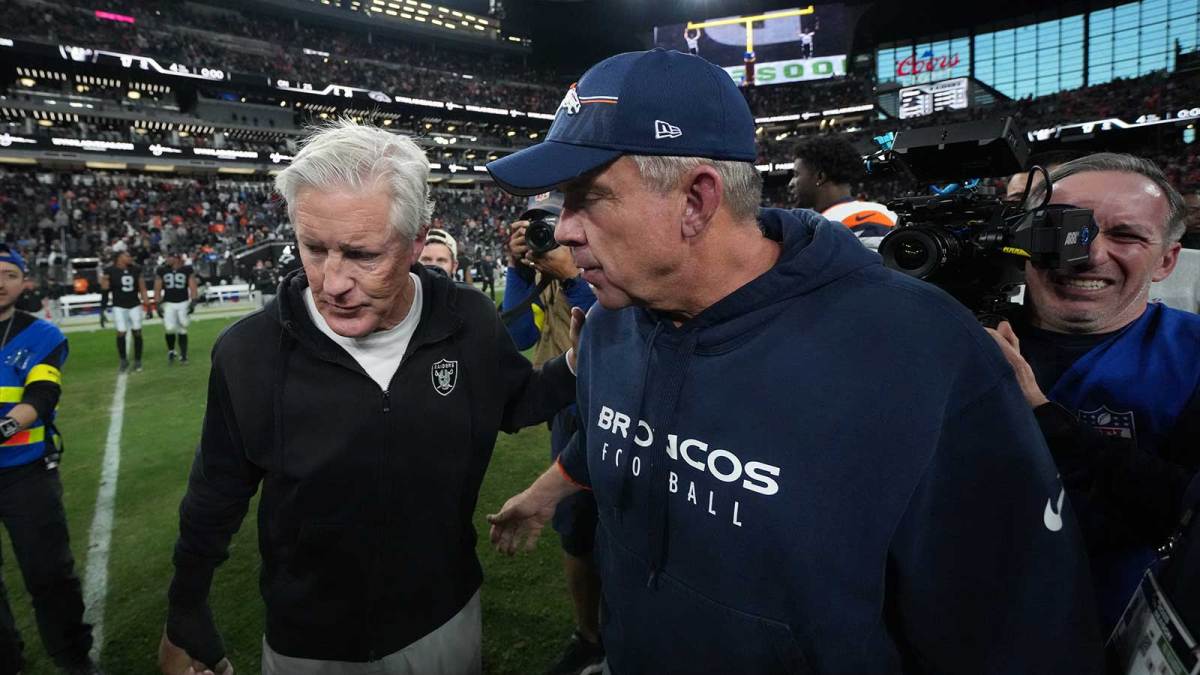 Las Vegas Raiders head coach Pete Carroll and Denver Broncos head coach Sean Payton meet on the field following a game at Allegiant Stadium.