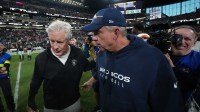 Las Vegas Raiders head coach Pete Carroll and Denver Broncos head coach Sean Payton meet on the field following a game at Allegiant Stadium.