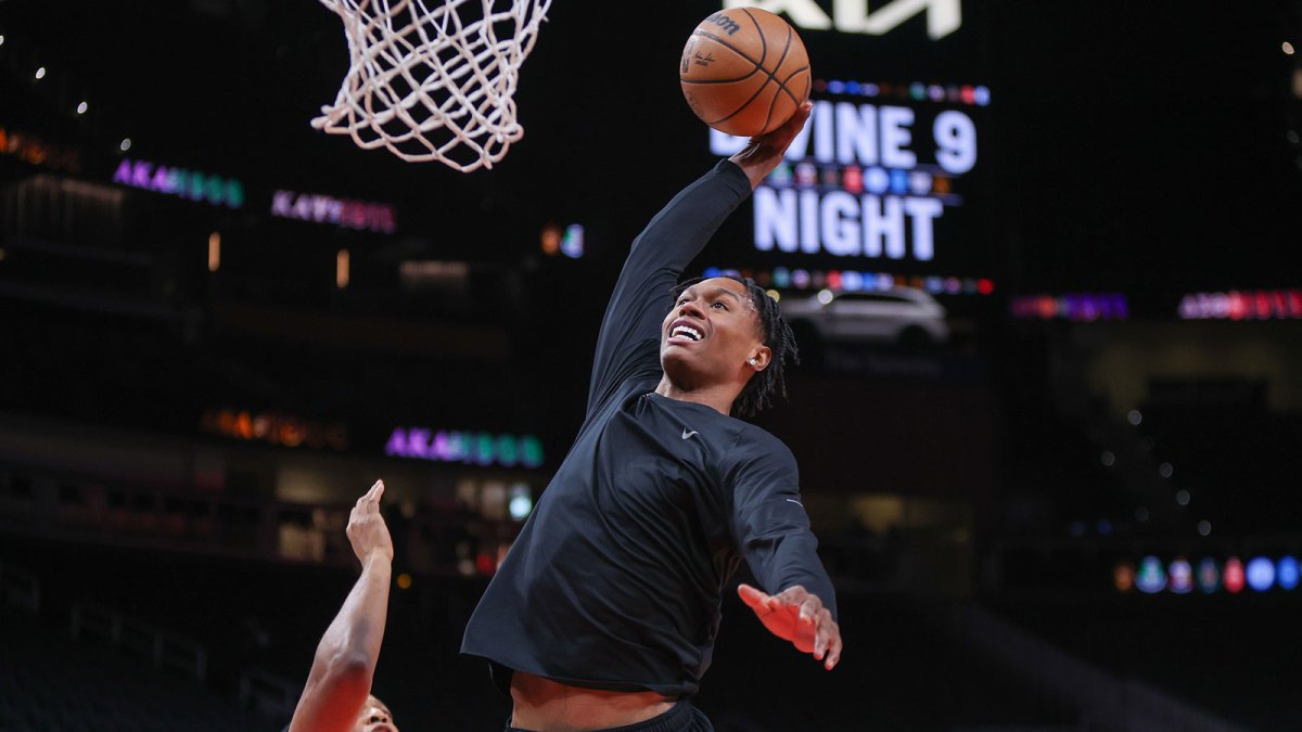 Denver Nuggets guard Peyton Watson (8) dunks before a game against the Atlanta Hawks at State Farm Arena.
