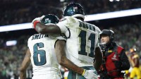 Philadelphia Eagles wide receiver Devonta Smith (6) celebrates with wide receiver A.J. Brown (11) after making a catch for a touchdown against the Washington Commanders in the first half at Northwest Stadium. Mandatory Credit: Geoff Burke-Imagn Images
