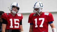 Indianapolis Colts quarterbacks Philip Rivers (17) and Riley Leonard (15) talk Wednesday, Dec. 10, 2025, during practice at the Colts training facility in Indianapolis.