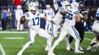 Indianapolis Colts quarterback Philip Rivers (17) passes against the Seattle Seahawks during the fourth quarter at Lumen Field