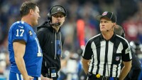 Indianapolis Colts quarterback Philip Rivers (17) talks with Indianapolis Colts head coach Shane Steichen and an official Monday, Dec. 22, 2025, during a game against the San Francisco 49ers at Lucas Oil Stadium in Indianapolis.