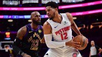 Detroit Pistons forward Tobias Harris (12) controls the ball against Los Angeles Lakers forward LeBron James (23) during the first half at Crypto.com Arena.