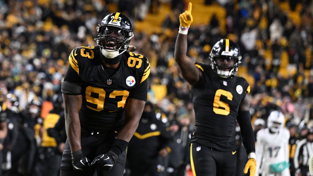 Pittsburgh Steelers defensive end Esezi Otomewo (93) celebrates after a defensive stop in the fourth quarter against the Miami Dolphins at Acrisure Stadium.
