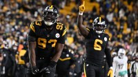 Pittsburgh Steelers defensive end Esezi Otomewo (93) celebrates after a defensive stop in the fourth quarter against the Miami Dolphins at Acrisure Stadium.