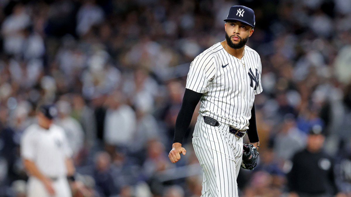 New York Yankees pitcher Devin Williams (38) reacts after giving up a two run RBI during the seventh inning during game four of the ALDS round for the 2025 MLB playoffs at Yankee Stadium.