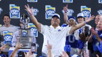 BYU Cougars head coach Kalani Sitake celebrates after beating Georgia Tech Yellow Jackets in the Pop-Tarts Bowl at Camping World Stadium.
