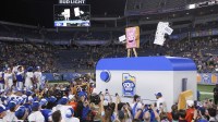 Pop-Tarts mascots celebrate with BYU Cougars after beating Georgia Tech Yellow Jackets in the Pop-Tarts Bowl at Camping World Stadium.