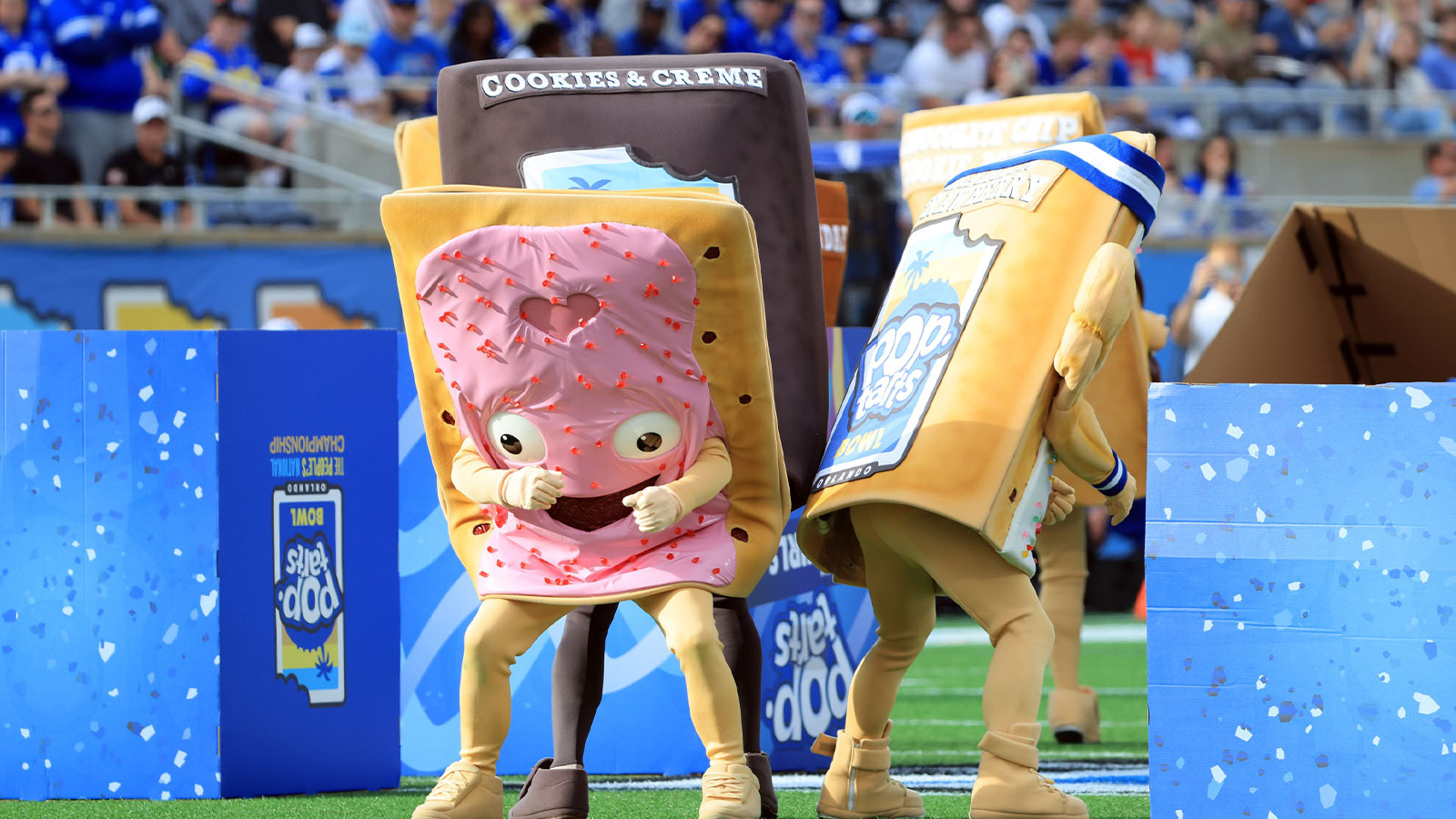 Pop-tart mascots get pumped up before the game between the BYU Cougars and Georgia Tech Yellow Jackets at Camping World Stadium. 
