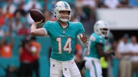 Miami Dolphins quarterback Quinn Ewers (14) throws downfield during the first quarter against the Tampa Bay Buccaneers at Hard Rock Stadium.