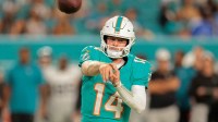Miami Dolphins quarterback Quinn Ewers (14) passes the football against the Jacksonville Jaguars during the fourth quarter at Hard Rock Stadium.