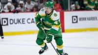 Minnesota Wild defenseman Quinn Hughes (43) skates with the puck during the first period against the Washington Capitals at Grand Casino Arena.