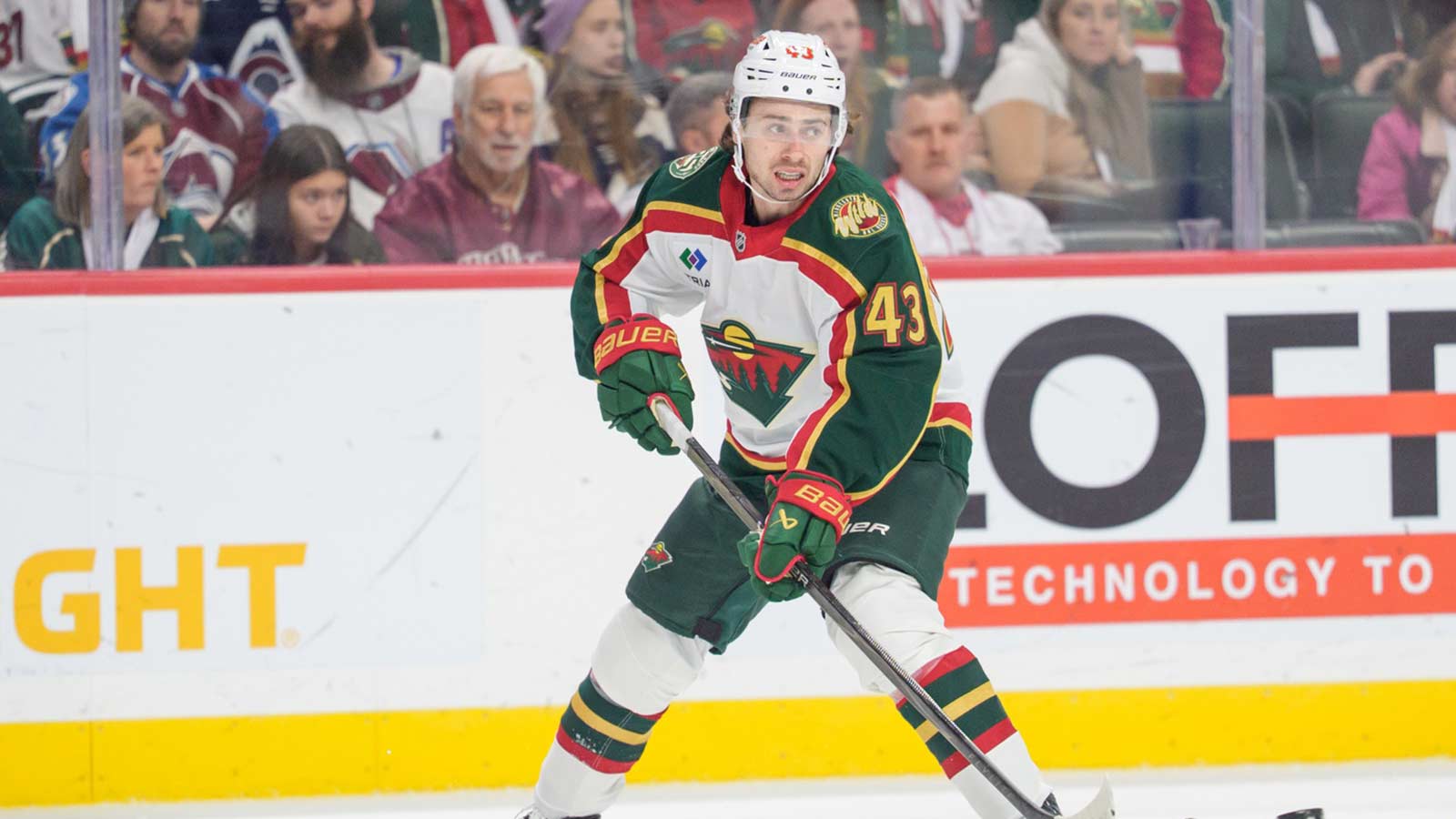 Minnesota Wild defenseman Quinn Hughes (43) clears the puck in the first period against the Colorado Avalanche at Grand Casino Arena.