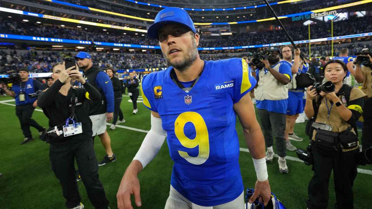 Rams quarterback Matthew Stafford (9) walks off the field.