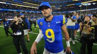 Rams quarterback Matthew Stafford (9) walks off the field.