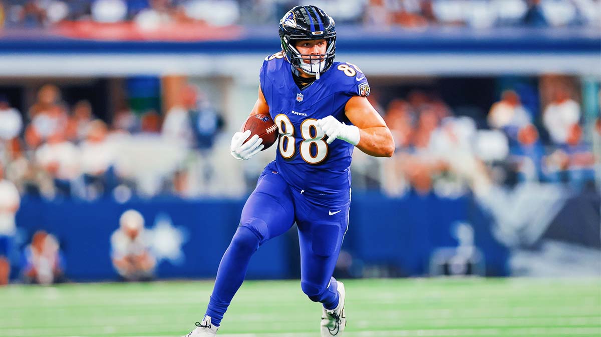 Baltimore Ravens tight end Charlie Kolar (88) runs after a catch during the first quarter against the Dallas Cowboys at AT&T Stadium.