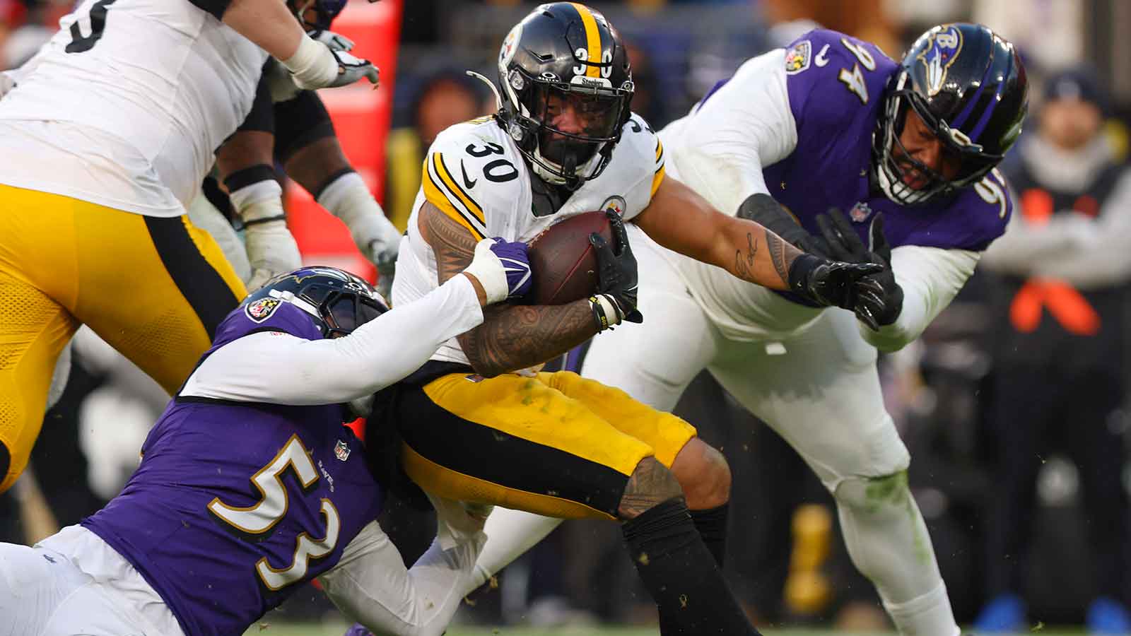 Baltimore Ravens linebacker Kyle van Noy (53) tackles Pittsburgh Steelers running back Jaylen Warren (30) during the second half at M&T Bank Stadium.