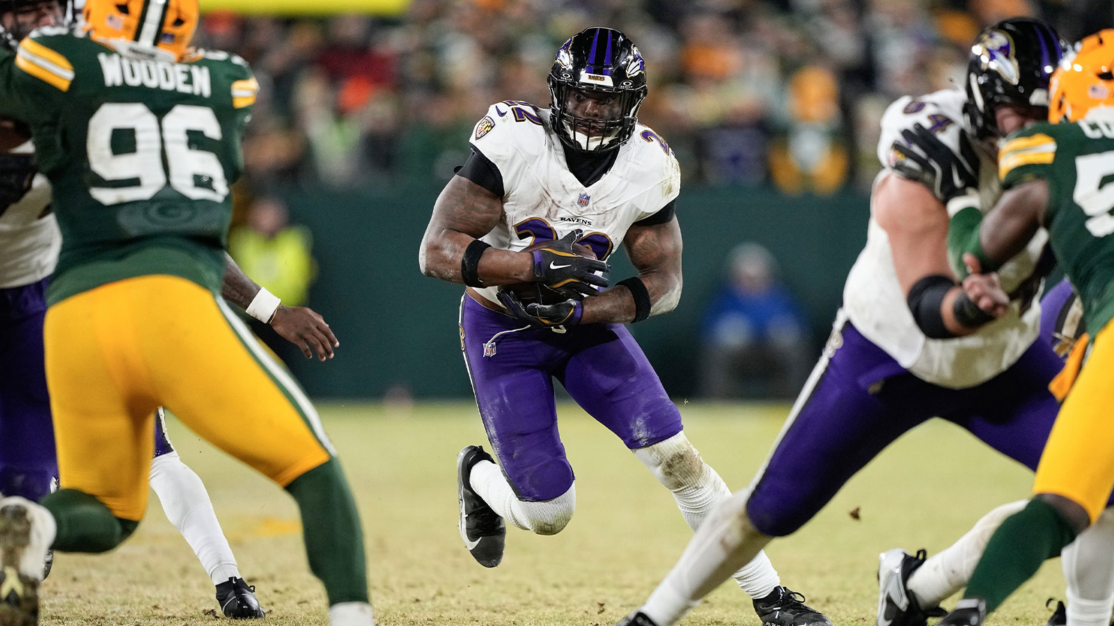 Baltimore Ravens running back Derrick Henry (22) rushes with the football during the fourth quarter against the Green Bay Packers at Lambeau Field. 
