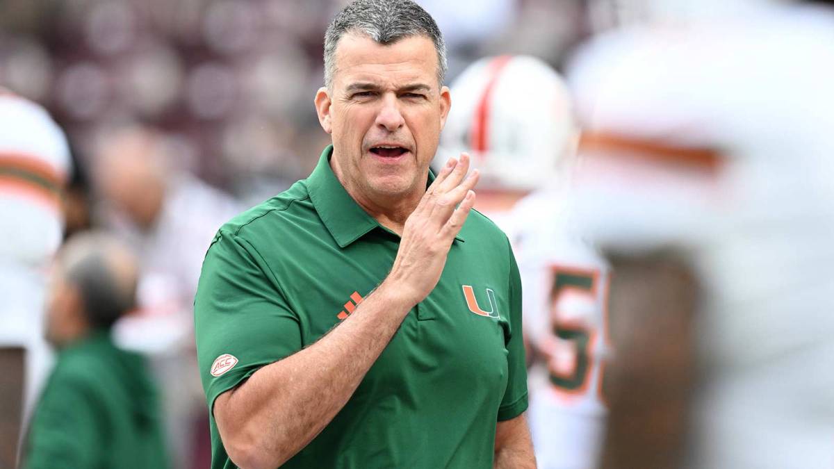 Miami Hurricanes head coach Mario Cristobal reacts prior to the game against the Texas A&M Aggies during the first round of the CFP National Playoff at Kyle Field.