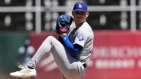Los Angeles Dodgers starting pitcher River Ryan (77) throws a pitch against the Oakland Athletics during the fourth inning at Oakland-Alameda County Coliseum.