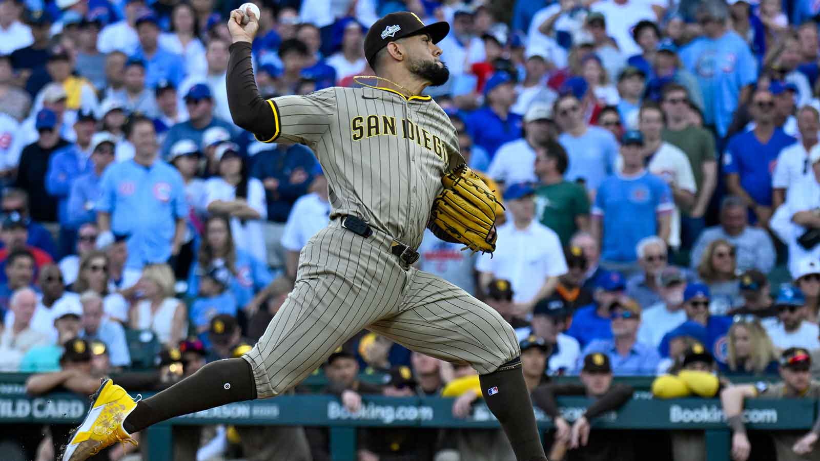 San Diego Padres relief pitcher Robert Suarez (75) delivers a pitch against the Chicago Cubs in the ninth inning during game two of the Wildcard round for the 2025 MLB playoffs at Wrigley Field