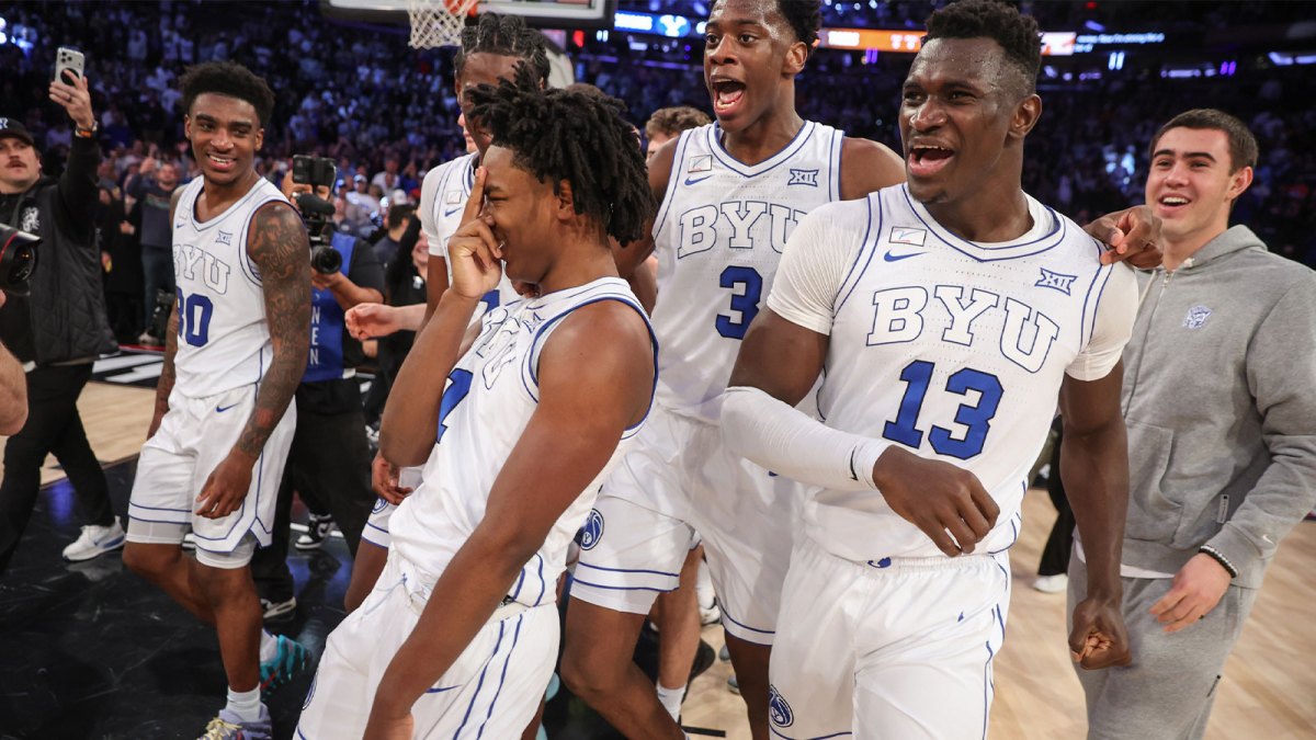 BYU Cougars guard Robert Wright III (1) celebrates with his teammates after hiting a game winning three point shot to beat the Clemson Tigers 67-64 at Madison Square Garden.