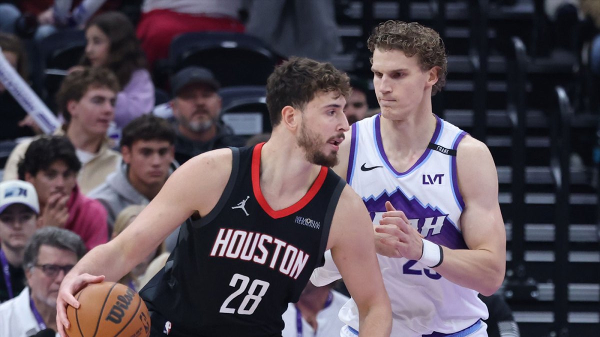 Houston Rockets center Alperen Sengun (28) posts up against Utah Jazz forward Lauri Markkanen (23) during the first quarter at Delta Center.