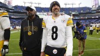 Pittsburgh Steelers head coach Mike Tomlin and quarterback Aaron Rodgers (8) walk off the field after the game against the Baltimore Ravens at M&T Bank Stadium.