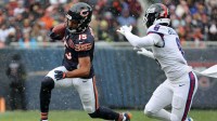 Chicago Bears wide receiver Rome Odunze (15) makes a catch against New York Giants safety Jevon Holland (8) during the first half at Soldier Field.