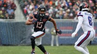 Chicago Bears wide receiver Rome Odunze (15) makes a catch against New York Giants safety Jevon Holland (8) during the first half at Soldier Field.