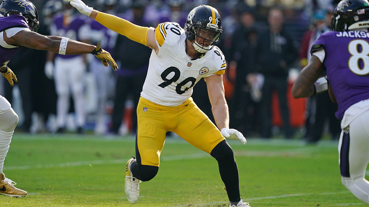Pittsburgh Steelers linebacker T.J. Watt (90) chases down Baltimore Ravens quarterback Lamar Jackson (8) during the first half at M&T Bank Stadium.