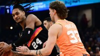 San Antonio Spurs guard Devin Vassell (24) drives to the basket against Cleveland Cavaliers forward Luke Travers (33) during the first half at Rocket Arena.