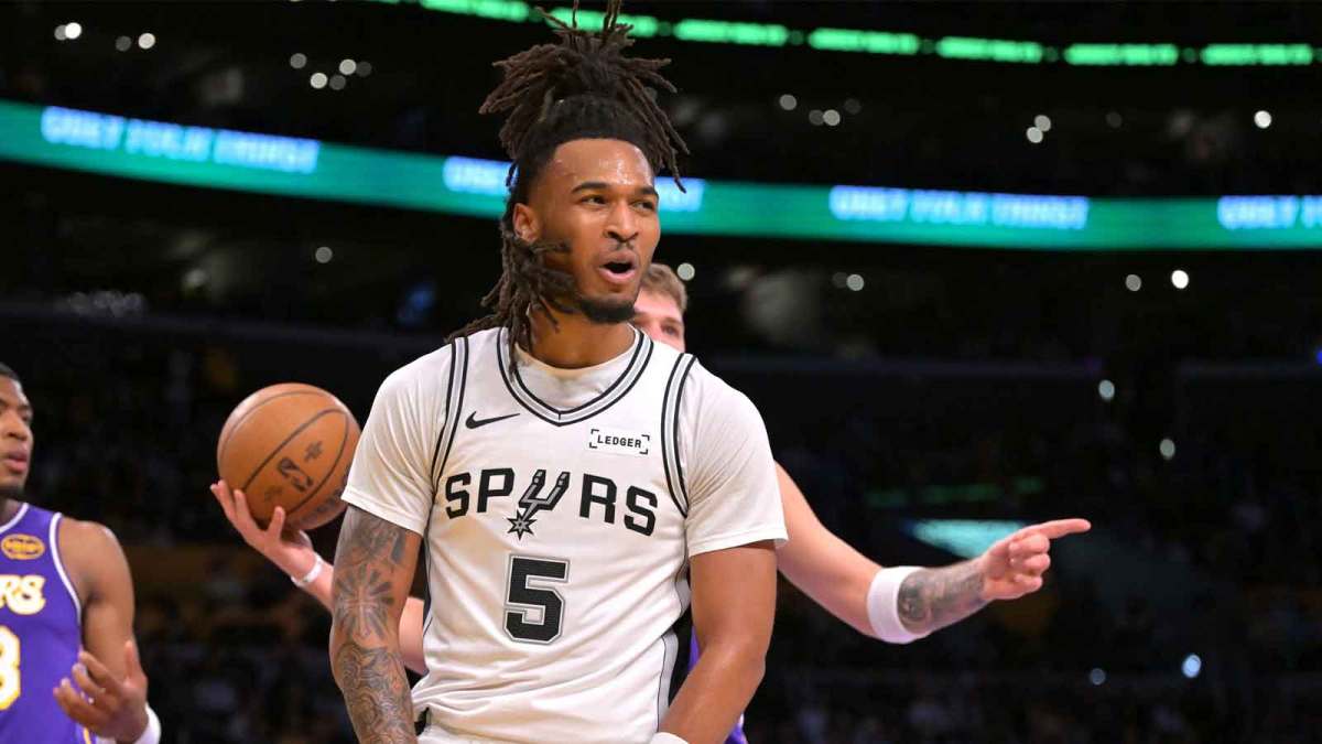 San Antonio Spurs guard Stephon Castle (5) reats after a basket and a foul called on Los Angeles Lakers guard Luka Doncic (77) during the first half at Crypto.com Arena.