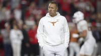 Texas Longhorns head coach Steve Sarkisian looks on prior to a game against the Georgia Bulldogs at Sanford Stadium.