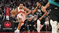 Toronto Raptors forward Scottie Barnes (4) dribbles the ball past Portland Trail Blazers forward Kris Murray (24) in the second half at Scotiabank Arena.