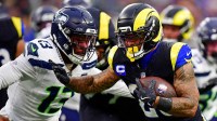Los Angeles Rams running back Kyren Williams (23) against Seattle Seahawks linebacker Ernest Jones IV (13) during the second half at SoFi Stadium.