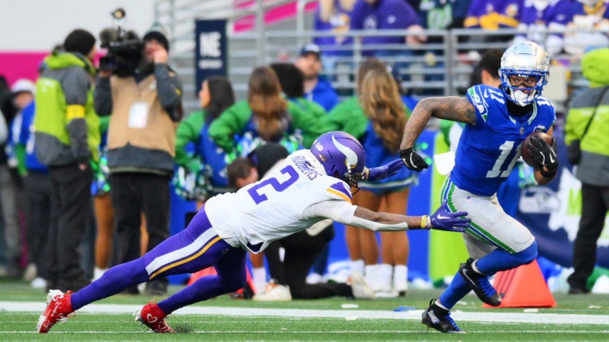 Seattle Seahawks wide receiver Jaxon Smith-Njigba (11) runs the ball after a catch during the second half against the Minnesota Vikings at Lumen Field.