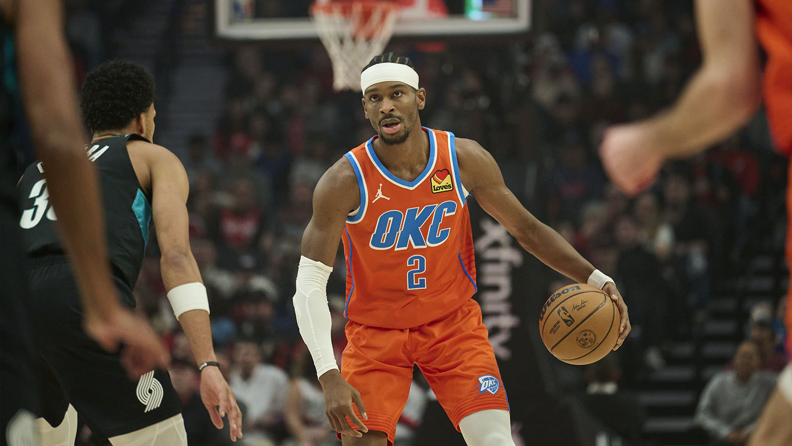  Oklahoma City Thunder guard Shai Gilgeous-Alexander (2) dribbles the basketball during the first half against Portland Trail Blazers forward Toumani Camara (33) at Moda Center. 