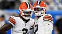 Cleveland Browns wide receiver Jerry Jeudy (3) and Cleveland Browns quarterback Shedeur Sanders (12) warm up before the game against the Detroit Lions at Ford Field.