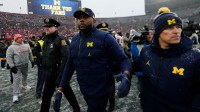 Michigan Wolverines head coach Sherrone Moore leaves the field following the NCAA football game against the Ohio State Buckeyes at Michigan Stadium in Ann Arbor, Mich. on Nov. 29, 2025. Ohio State won 27-9.