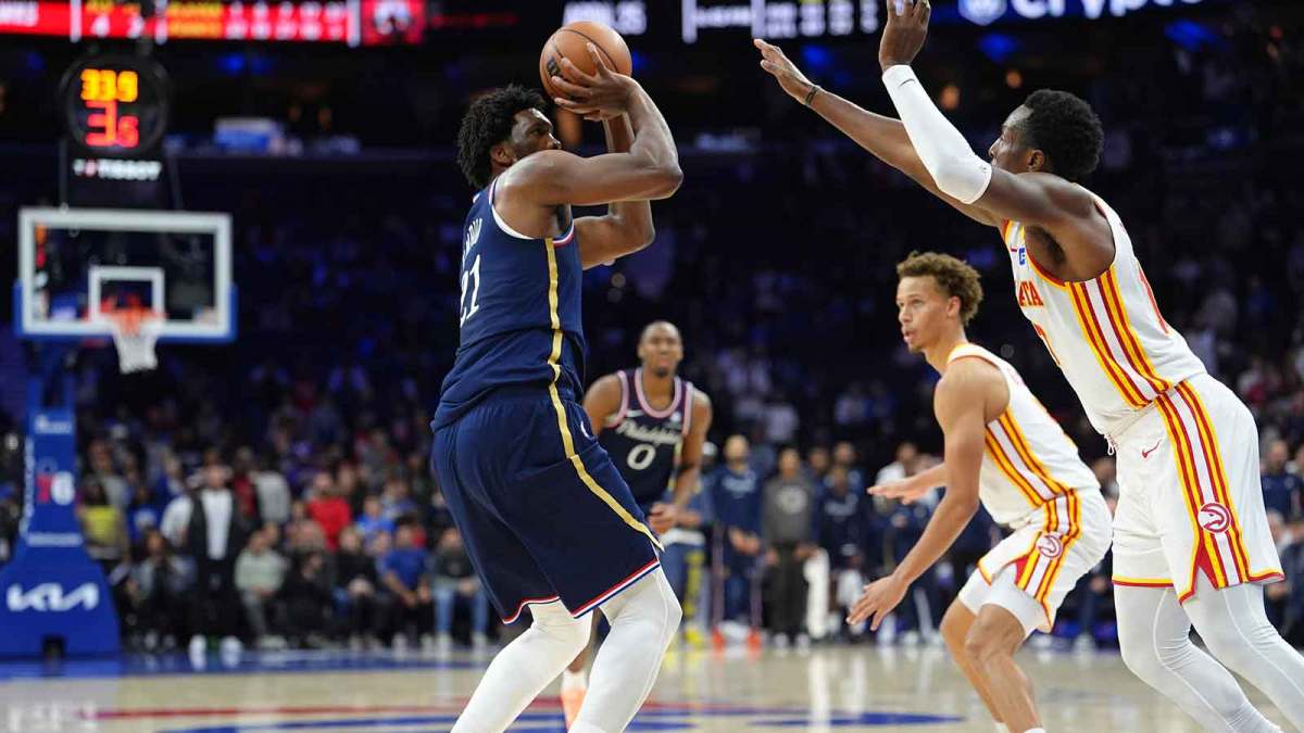 Philadelphia 76ers center Joel Embiid (21) shoots the ball against the Atlanta Hawks in overtime at Xfinity Mobile Arena.